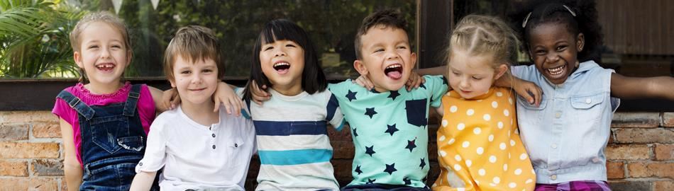 Kids hugging and laughing